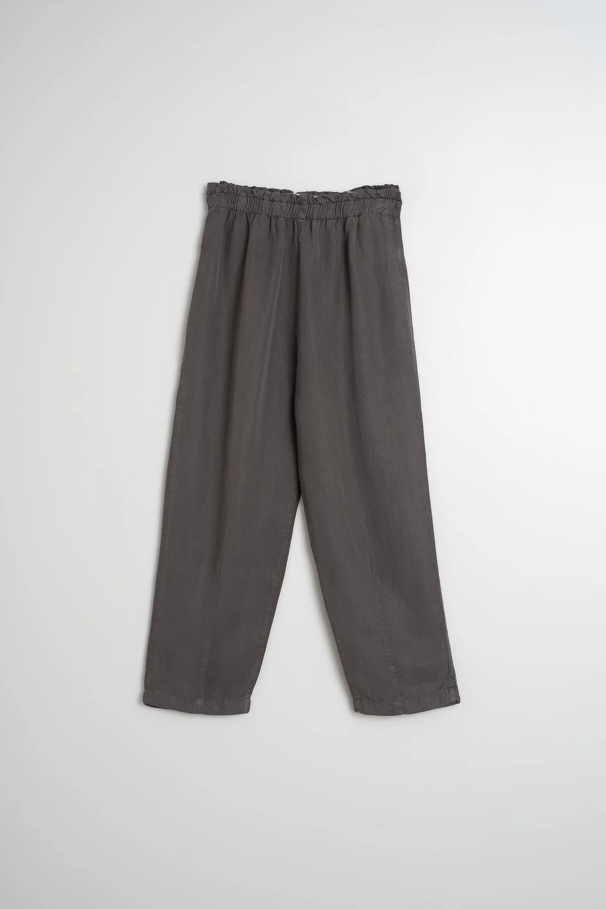 Flat lay of charcoal lyocell linen pants with a relaxed fit.