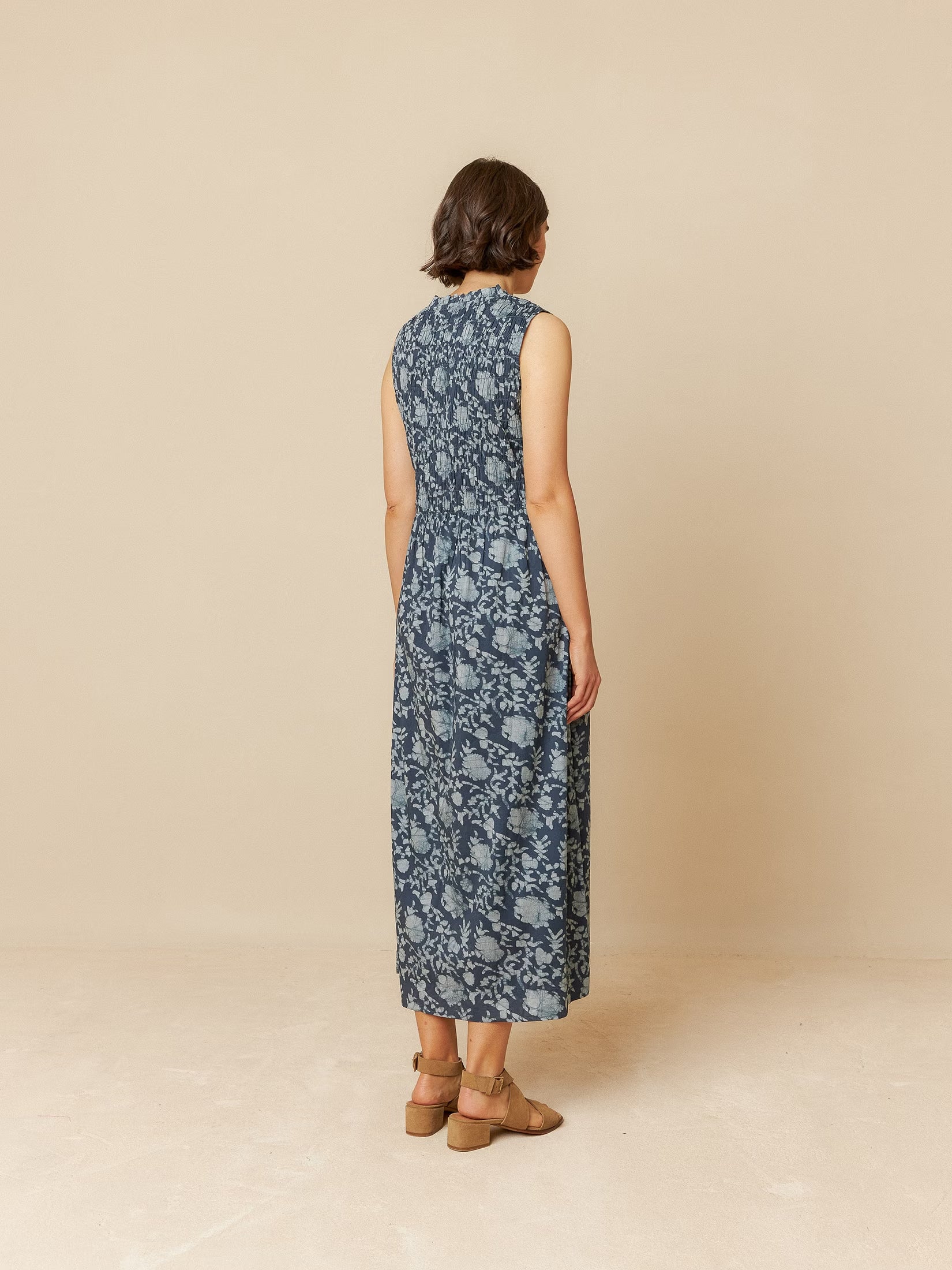 Model wearing a blue organic cotton long dress