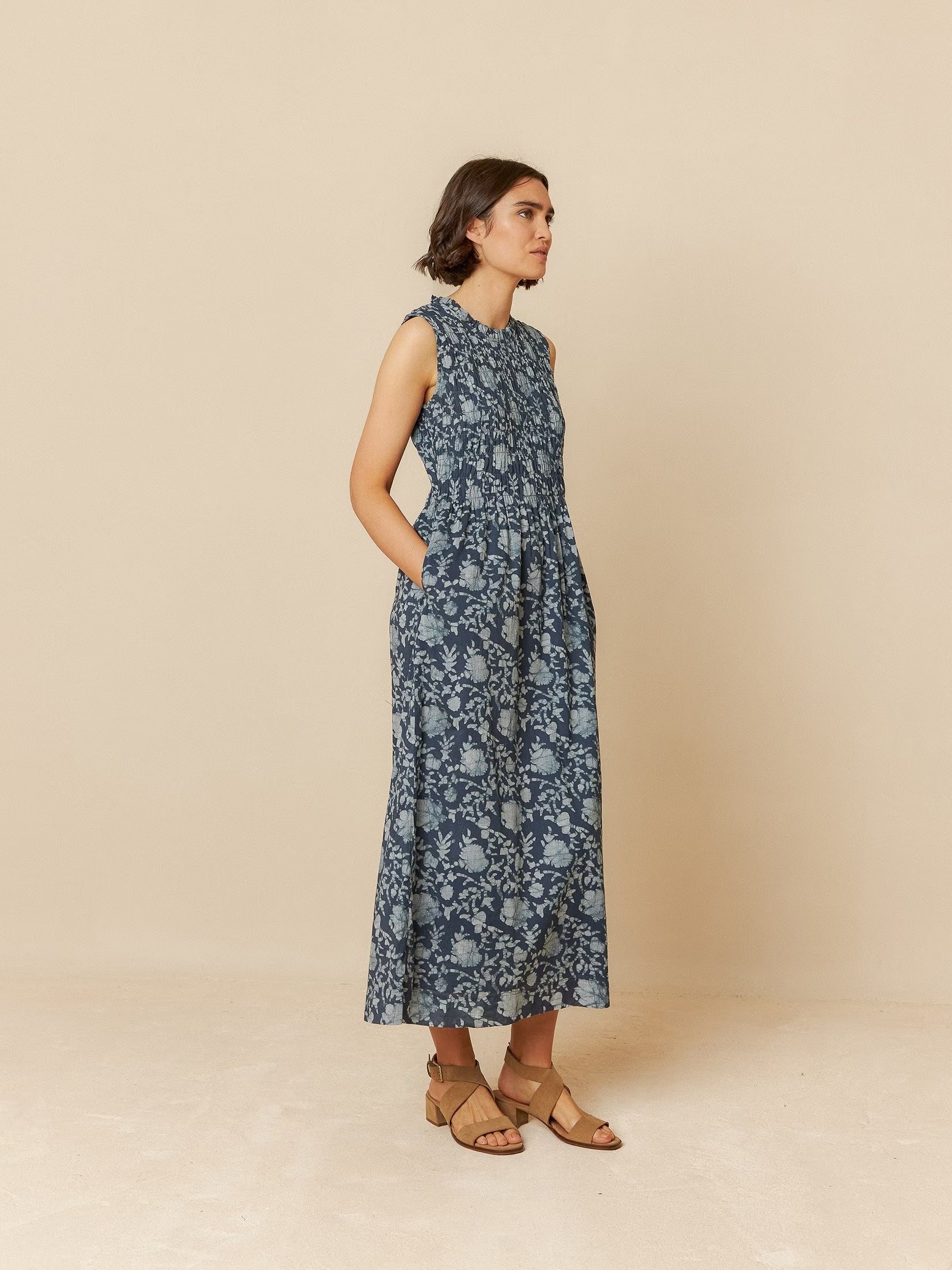 Model wearing a blue organic cotton long dress