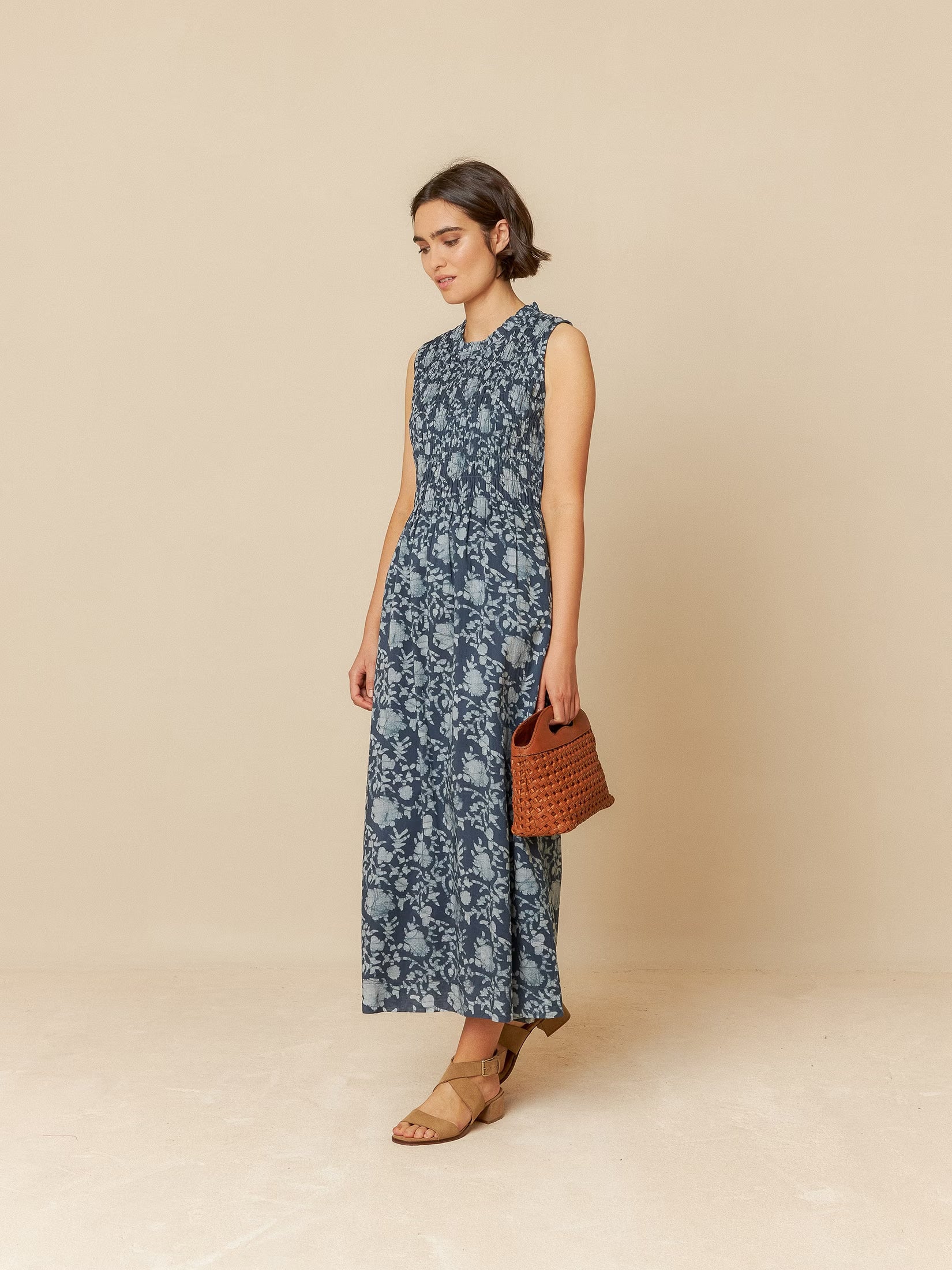 Model wearing a blue organic cotton long dress