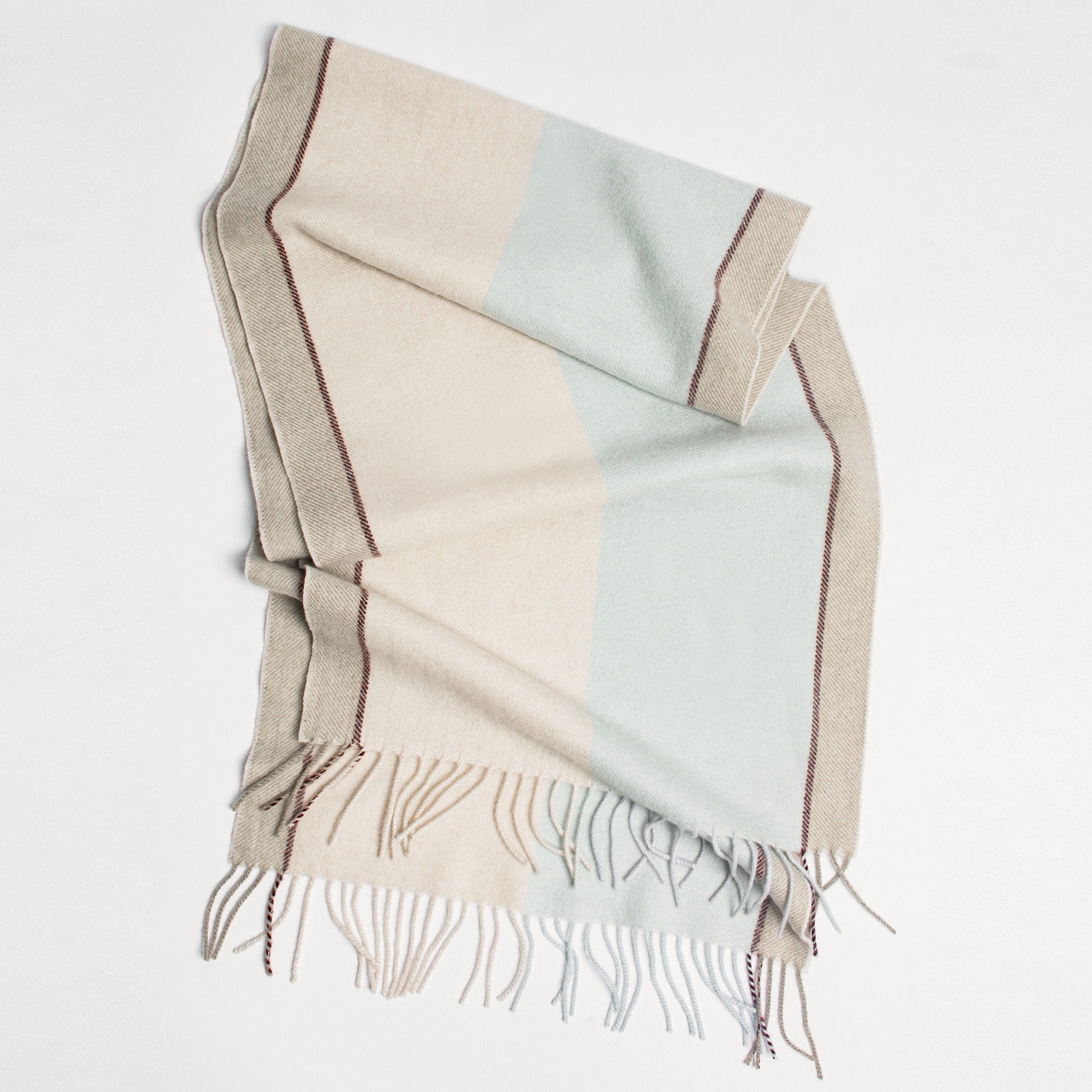 Soft cashmere scarf laid flat.