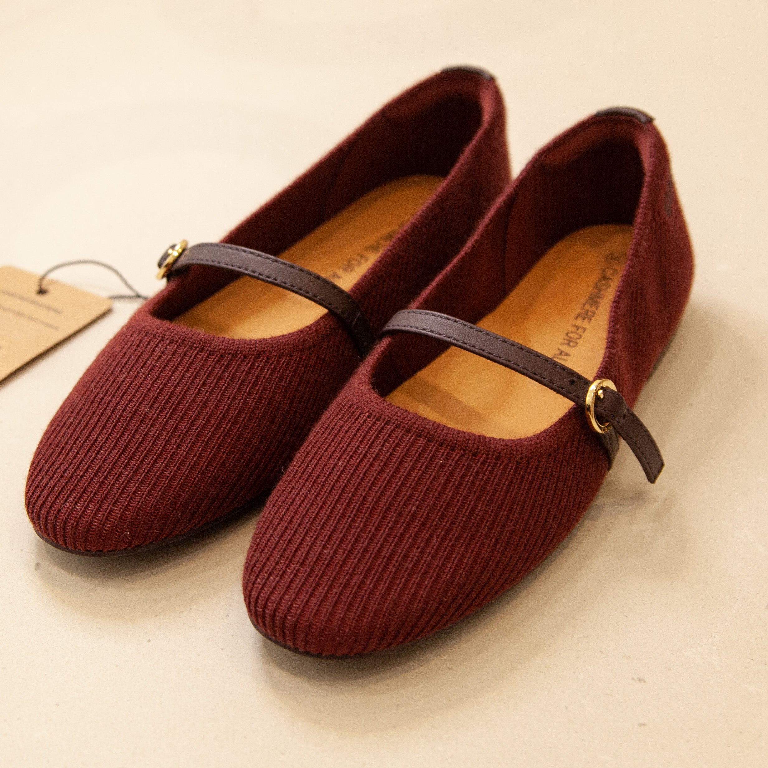 Burgundy cashmere Mary Jane shoes, flat lay, featuring a soft texture and classic, elegant design.