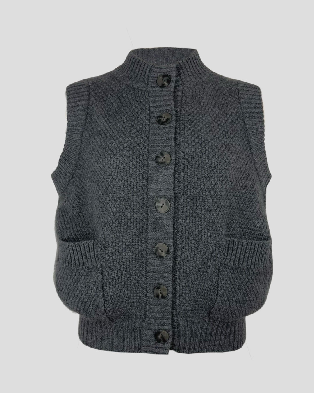 Dark gray moss stitch cashmere button vest with two front pockets and ribbed collar and hem for women.
